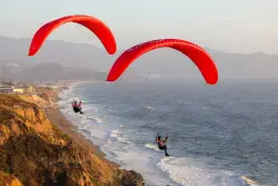 Photos: Paragliding pilots take flight from Mussel Rock Park cliffs in Daly City