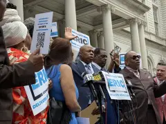 Flanked by aides raided by FBI, Mayor Adams launches reelection bid